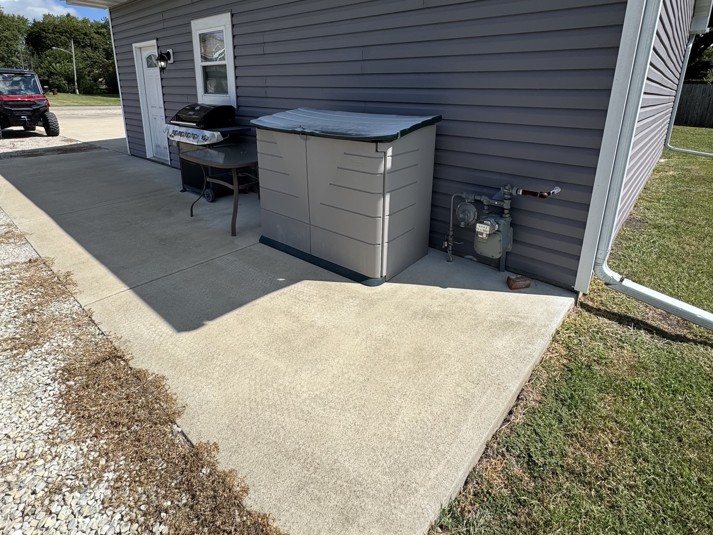 302 East Harrison Street Ransom, IL 60470 - Photo 14 of 19 a view of a backyard with chairs and a small barn