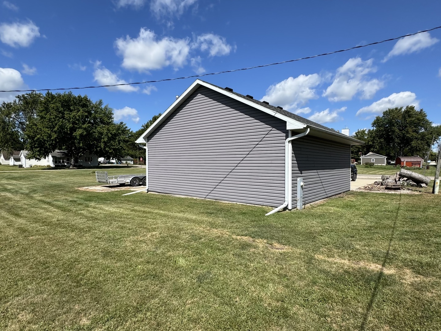 302 East Harrison Street Ransom, IL 60470 - Photo 16 of 19 a backyard of a house with table and chairs