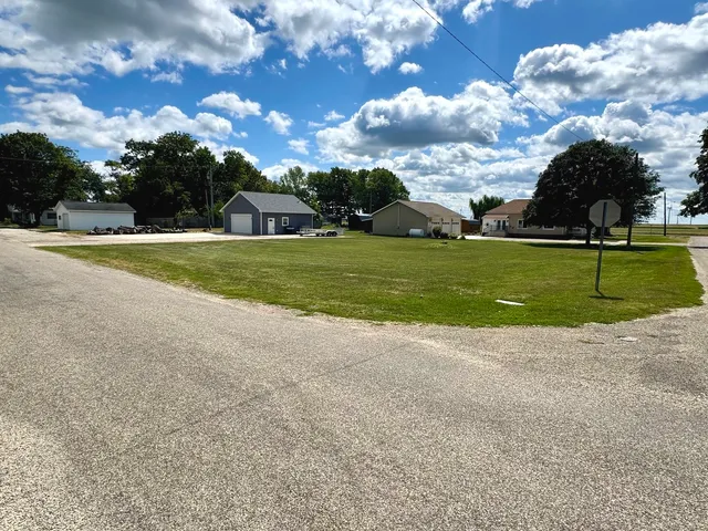 a view of a house with a big yard