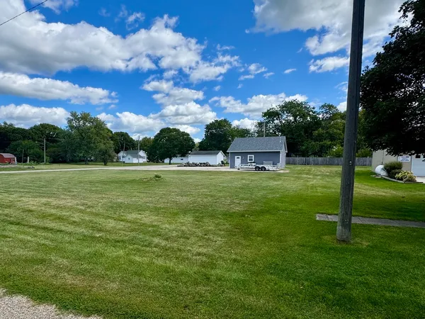 a view of a house with a big yard