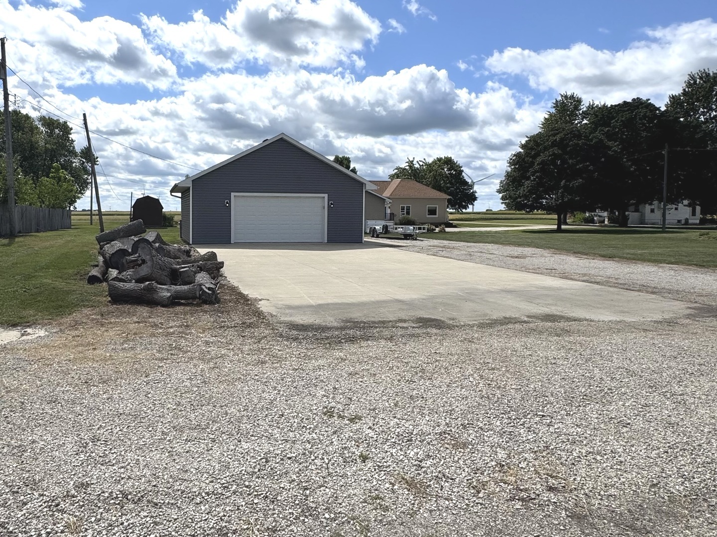 302 East Harrison Street Ransom, IL 60470 - Photo 10 of 19 a car parked in front of a house with a yard