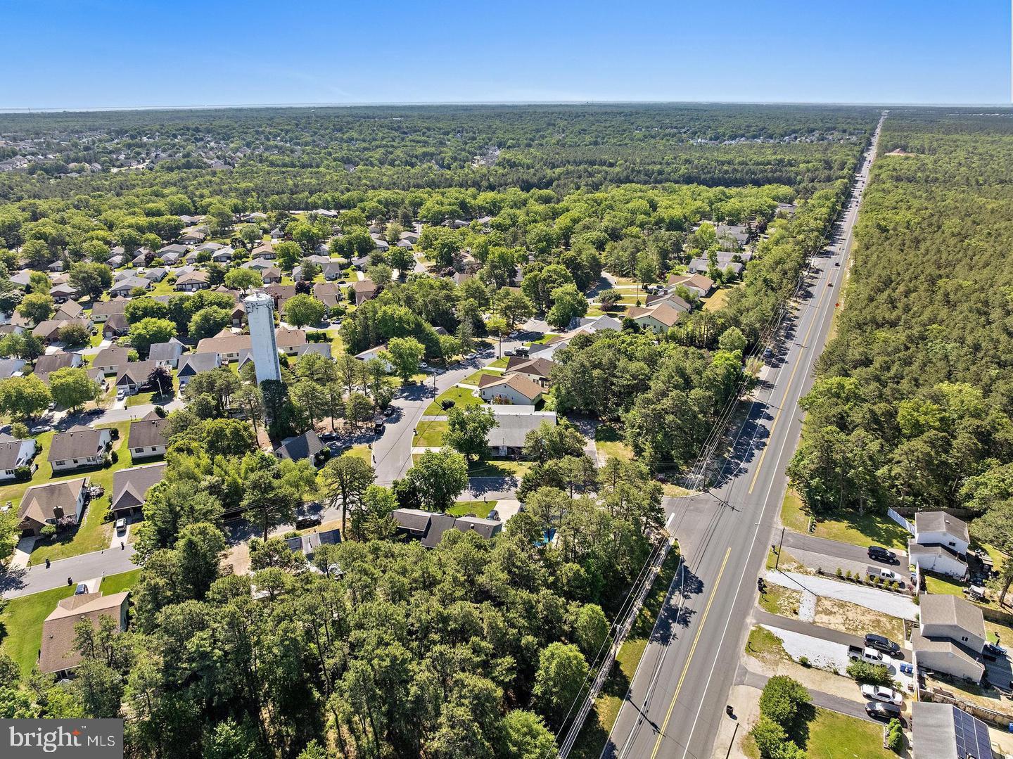 55 Sycamore Access Road Manahawkin, NJ 08050 - Photo 33 of 45 Serene suburban landscape awaits.