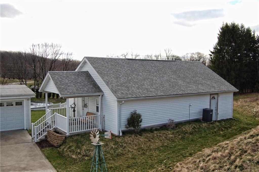 318 Rochester Road Freedom, PA 15042 - Photo 22 of 25 Cottage, workshop, play room, guest house, man cave or home based business. This building is currently a home based business and is ready for you to do the same. Base your office, accounting business, beauty shop, consulting service right here. It has all utilities and an operational rest room. There are hook ups for kitchen and shower. Easily transform the space into anything you desire.