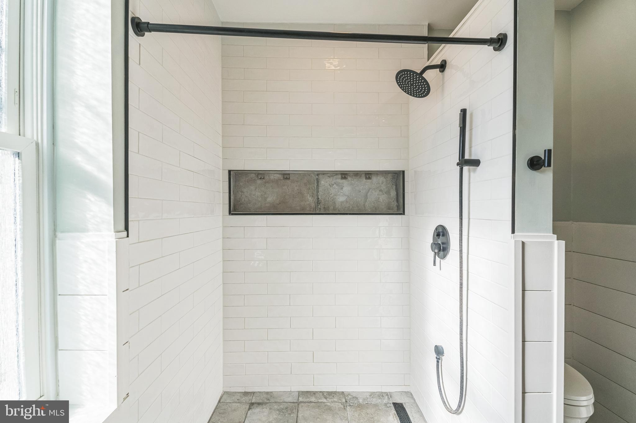 1838 Tree Street Philadelphia, PA 19145 - Photo 23 of 29 Full bath with tiled walk-in shower