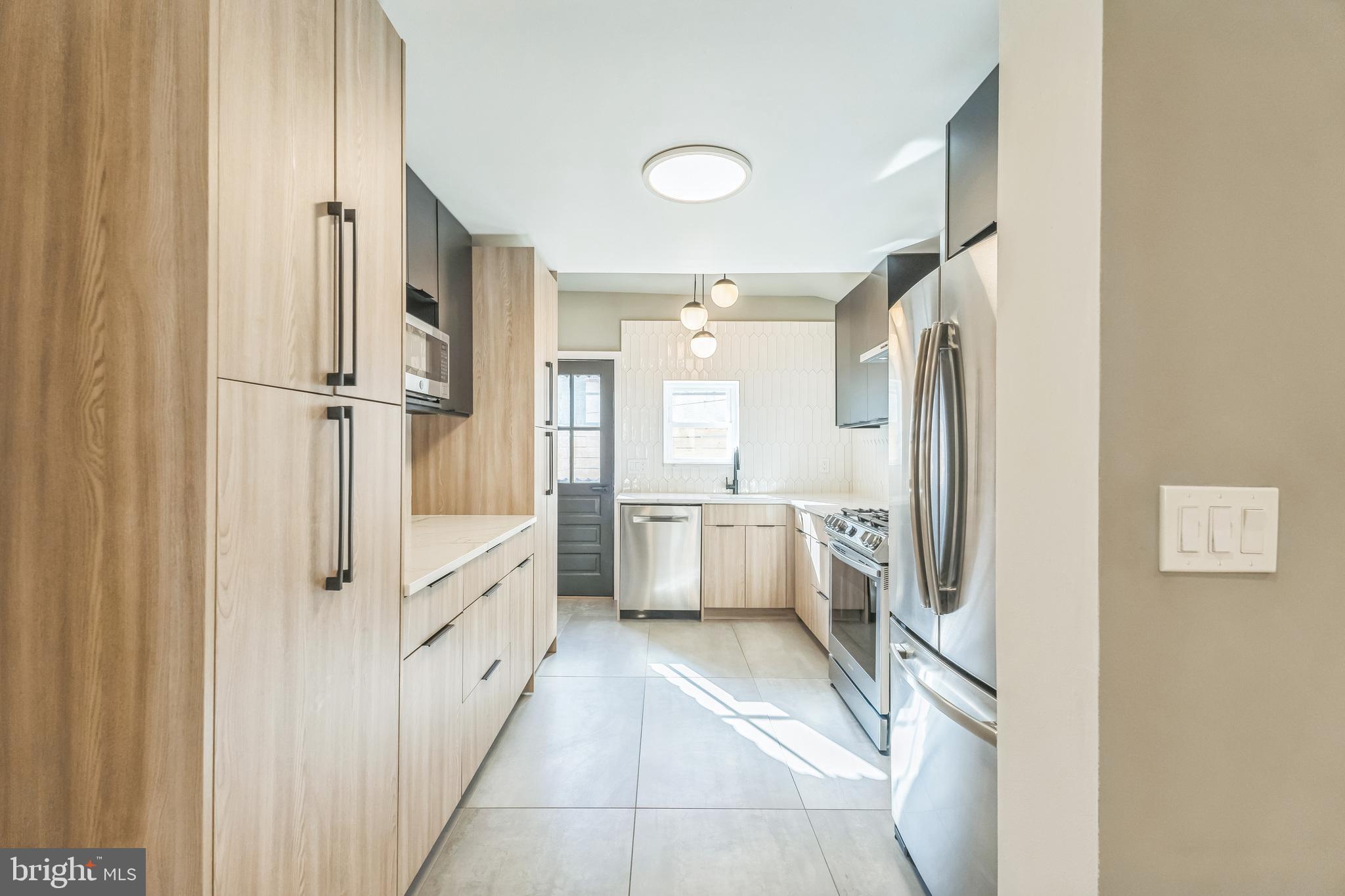 1838 Tree Street Philadelphia, PA 19145 - Photo 9 of 29 Custom galley kitchen with European cabinetry