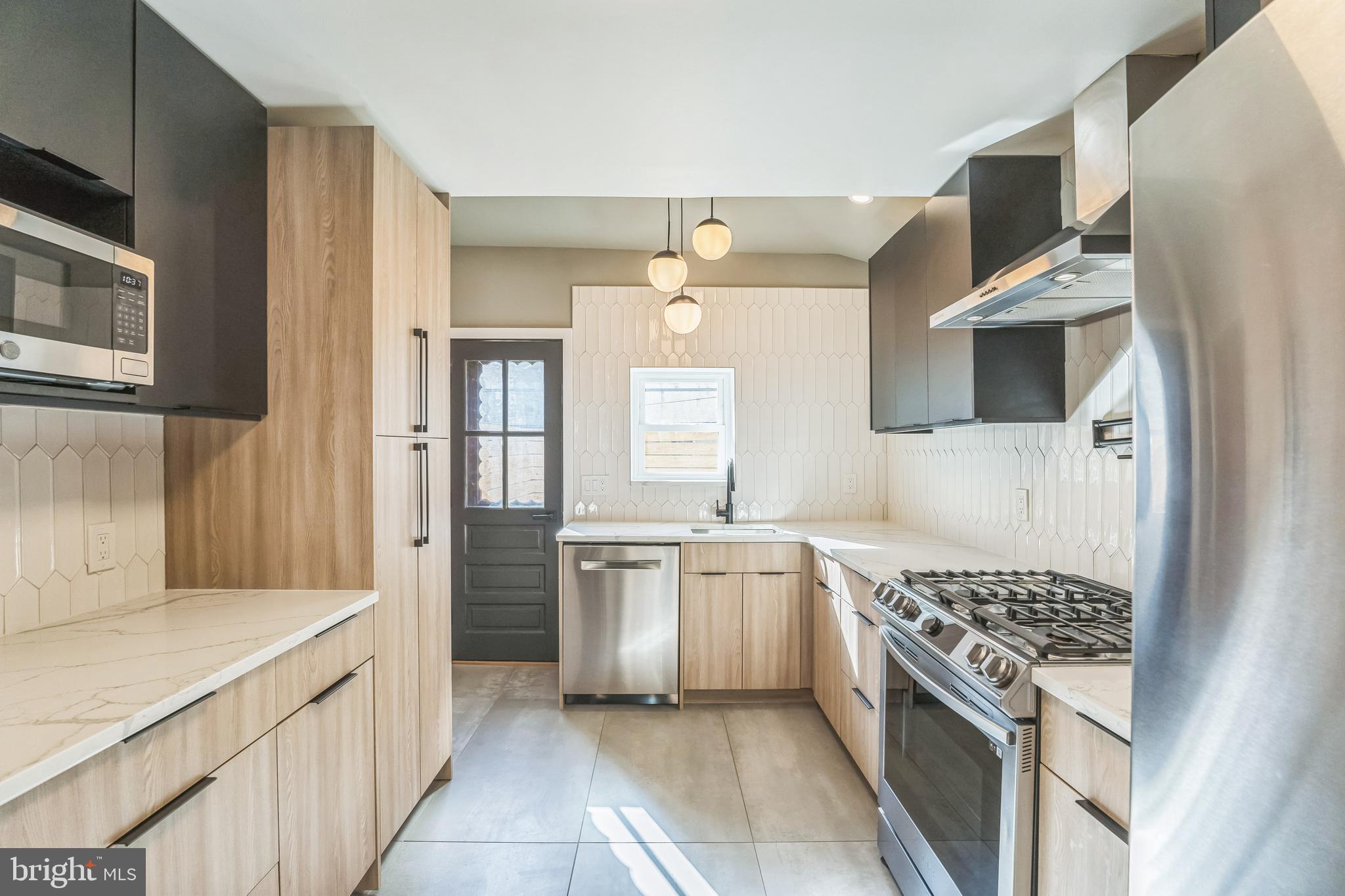 1838 Tree Street Philadelphia, PA 19145 - Photo 10 of 29 Custom galley kitchen with quartz countertops