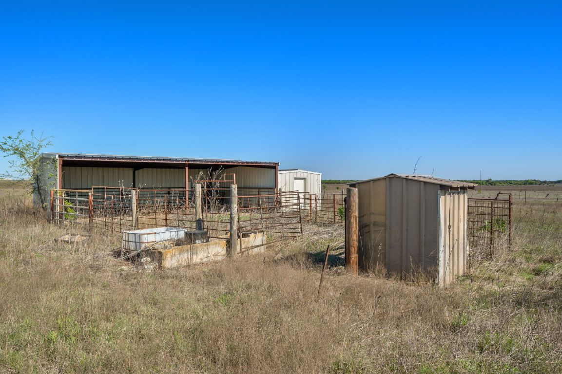 211 County Road 211 Bertram, TX 78605 - Photo 20 of 27 a view of house with backyard
