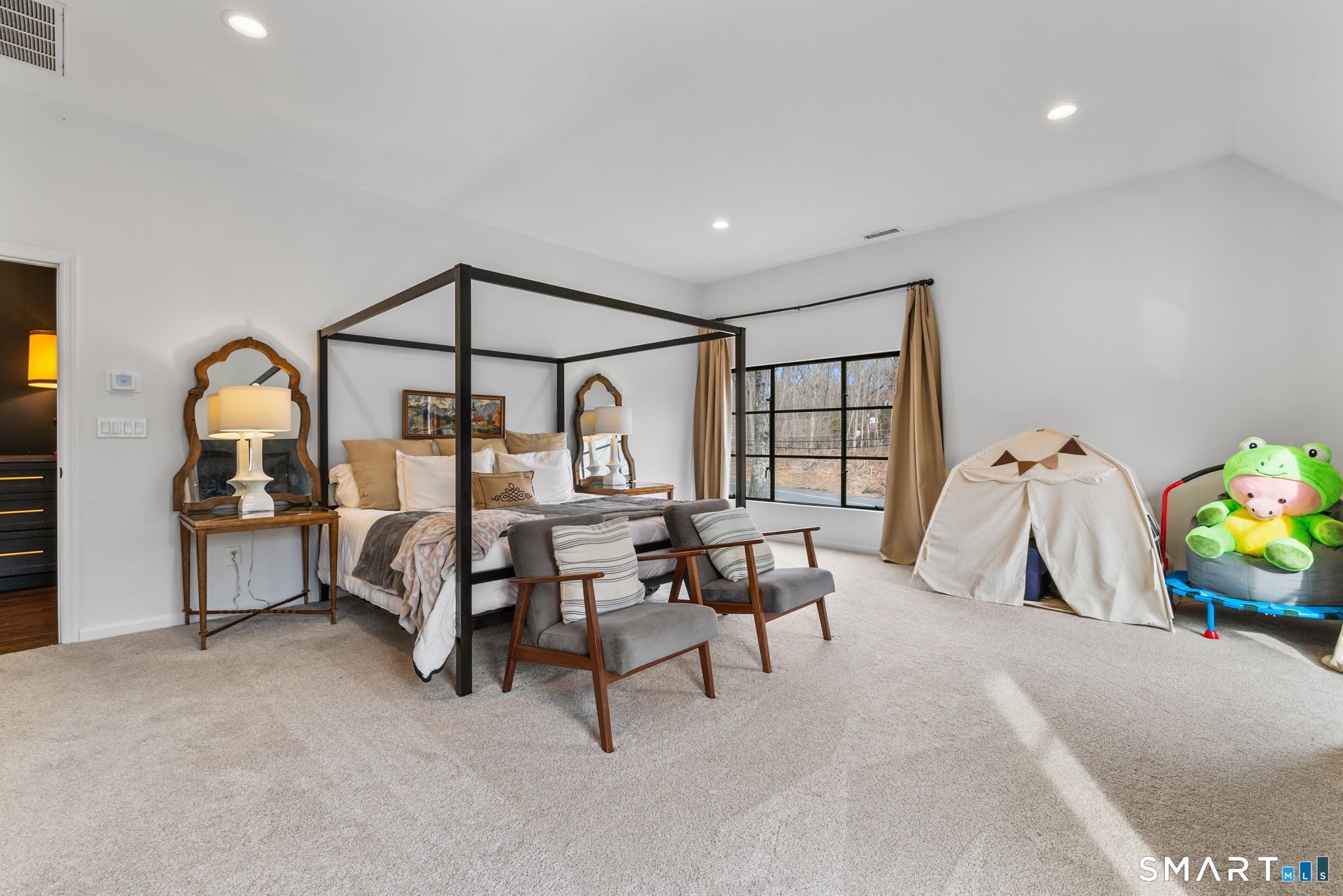 326 Thayer Pond Road Wilton, CT 06897 - Photo 13 of 40 a living room with furniture and a table