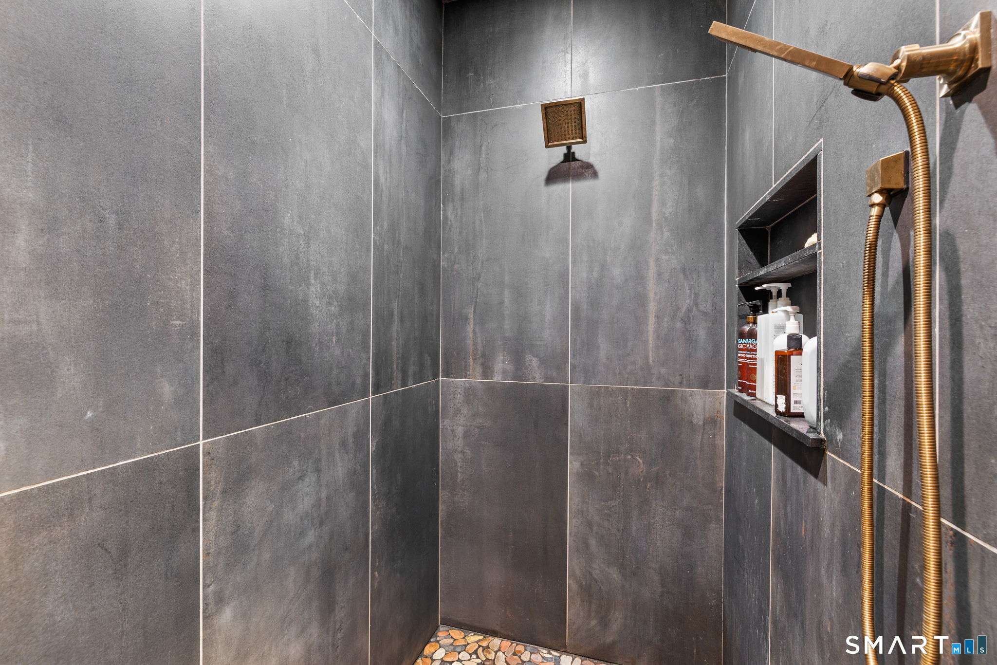 326 Thayer Pond Road Wilton, CT 06897 - Photo 19 of 40 a bathroom with a shower