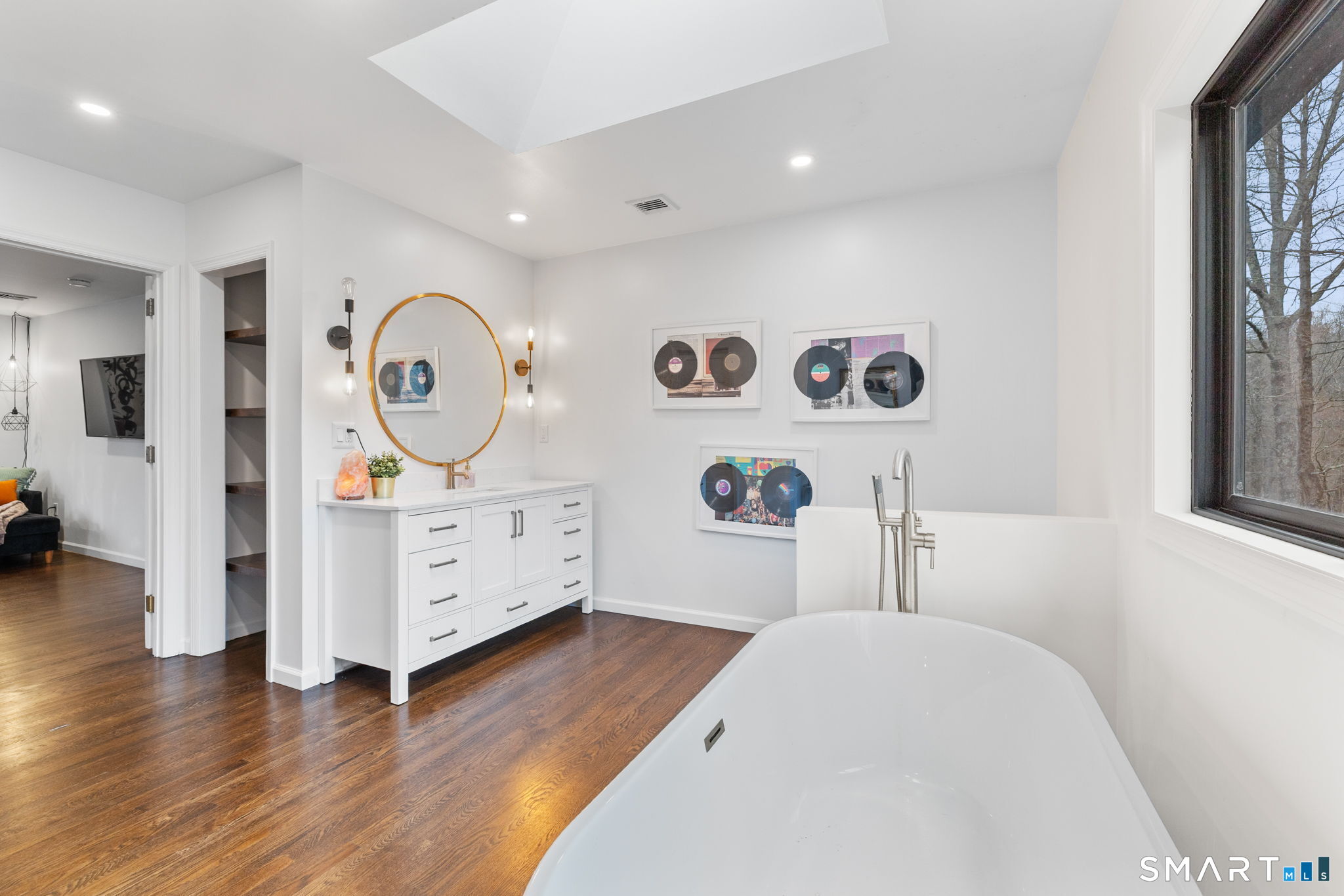 326 Thayer Pond Road Wilton, CT 06897 - Photo 27 of 40 a bedroom with a bed and a mirror on the dresser