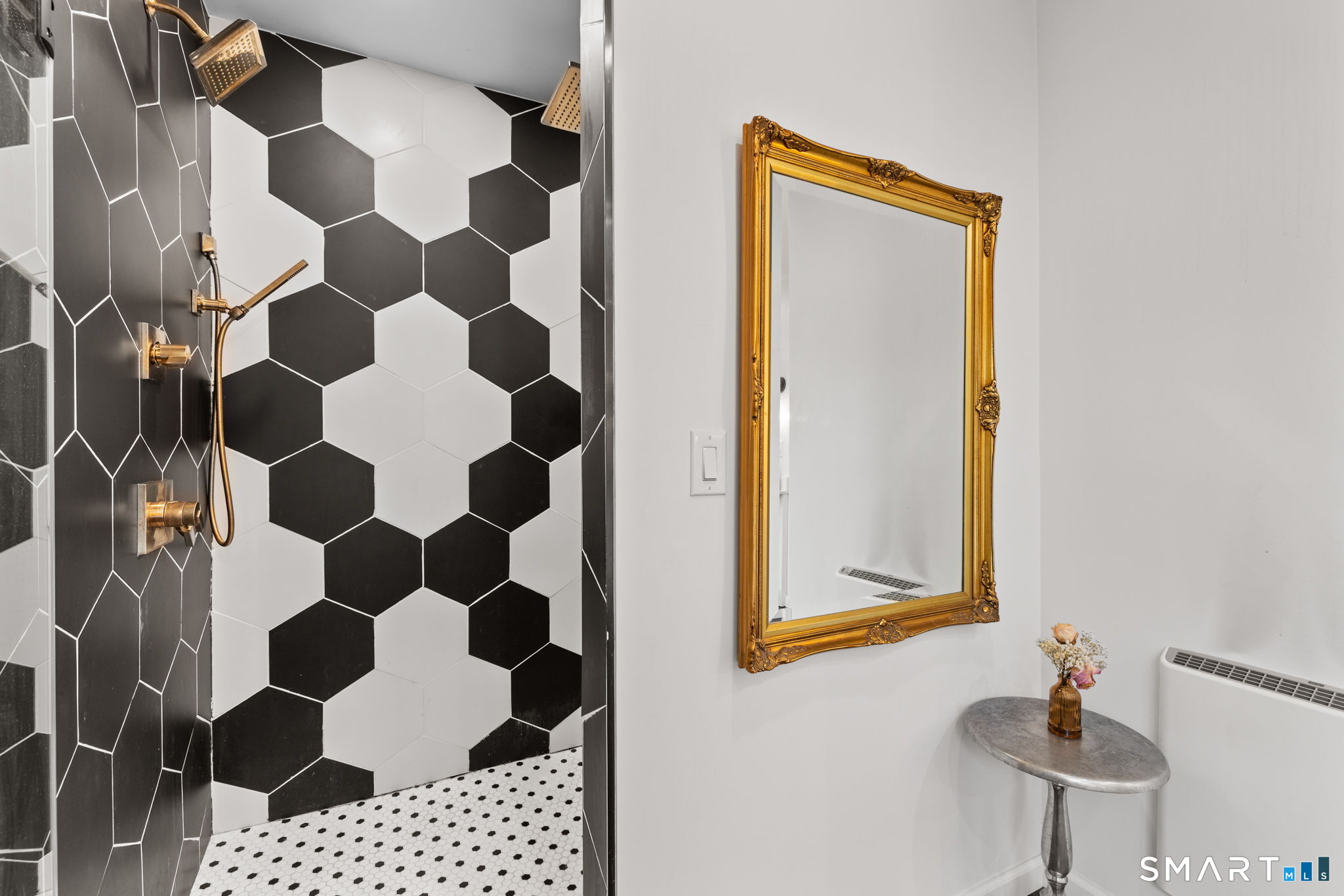 326 Thayer Pond Road Wilton, CT 06897 - Photo 28 of 40 a bathroom with a shower and a sink