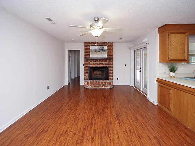 201 Turtle Cove Road Summerville, SC 29485 - Photo 15 of 44 Family room with wood burning fireplace