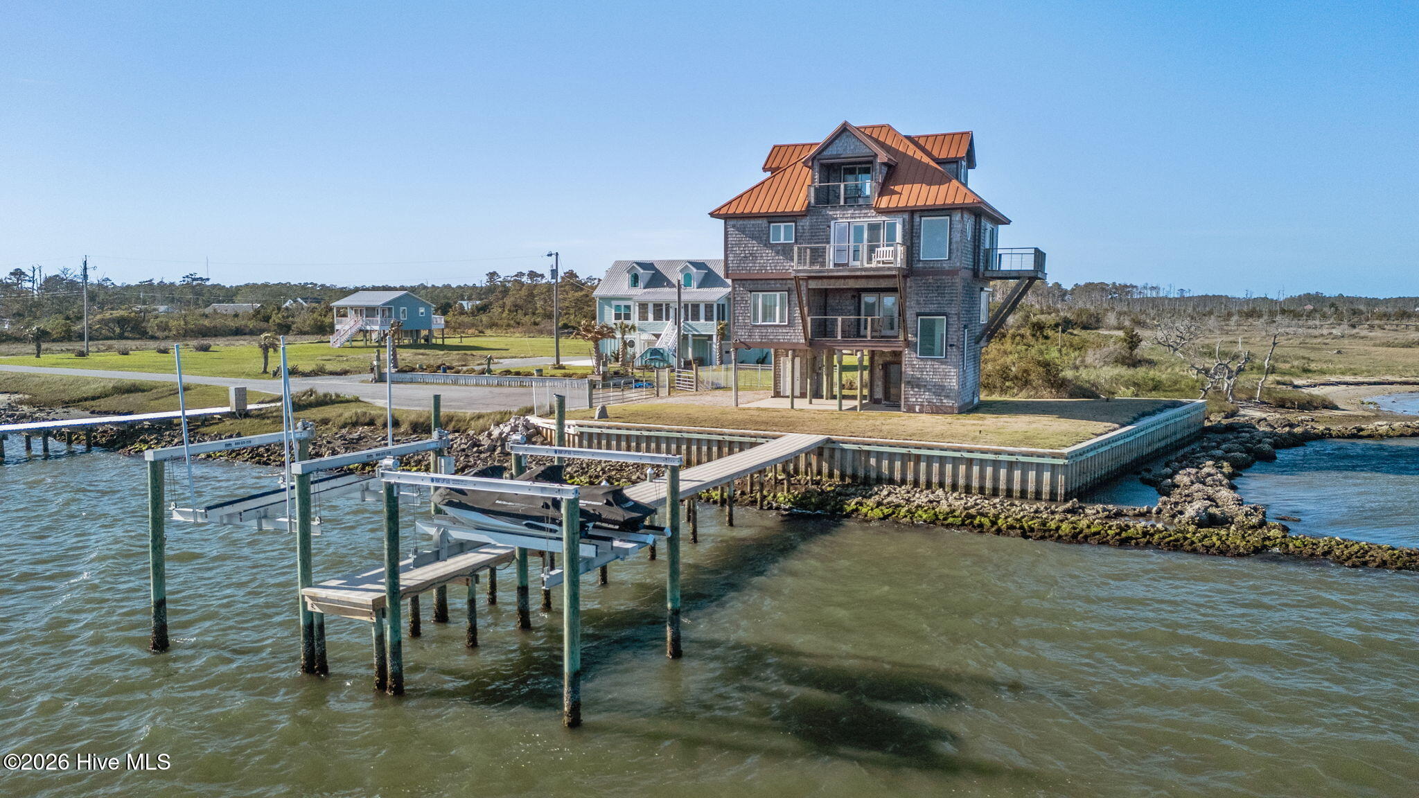 616 Nelson Neck Road Sealevel, NC 28577 - Photo 2 of 54 2-web-or-mls-DJI_20260331171142_0658_D