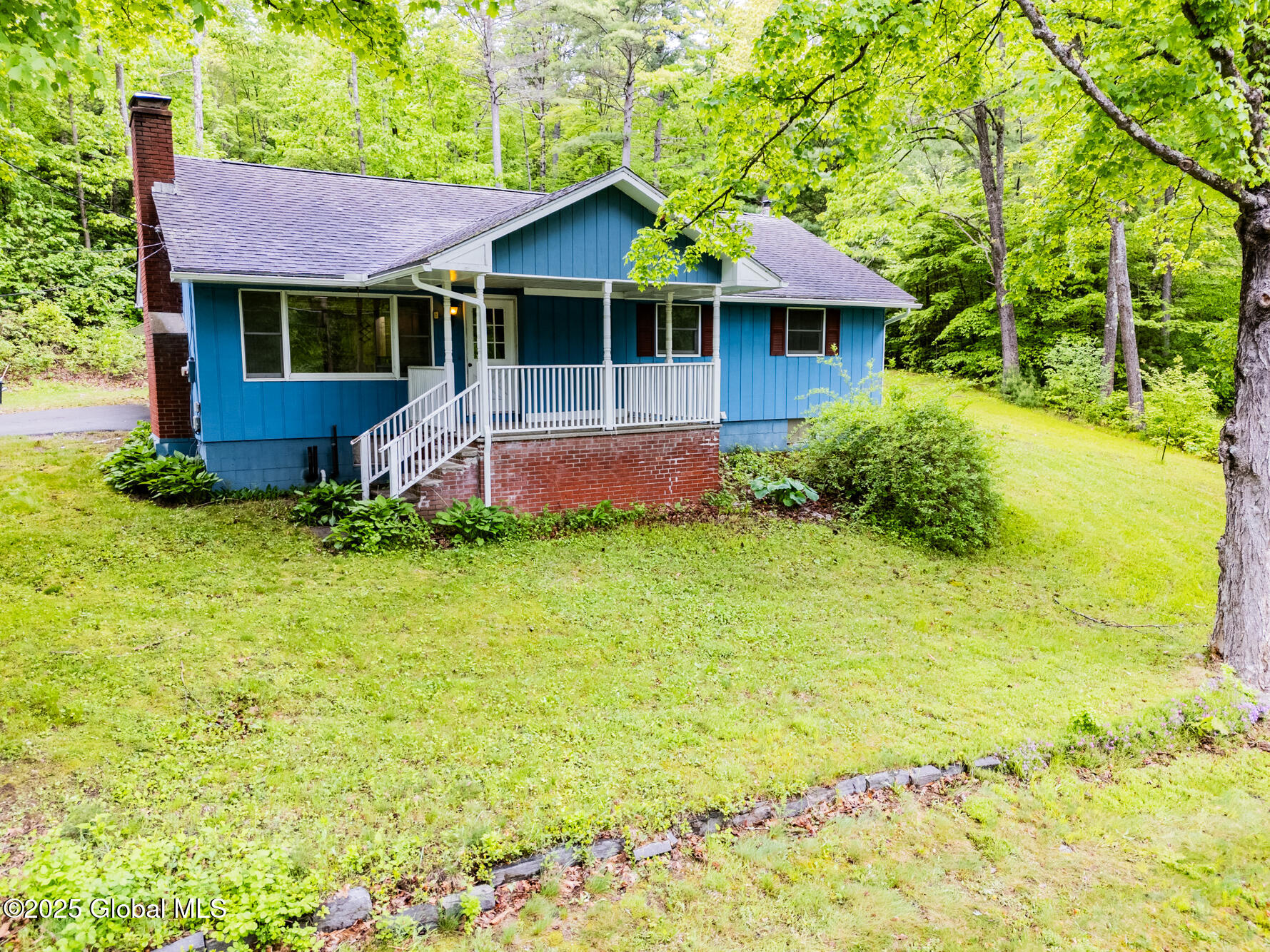 91 Middle Road Lake George, NY 12845 - Photo 3 of 57 20250522-DJI_20250522121612_0387_D