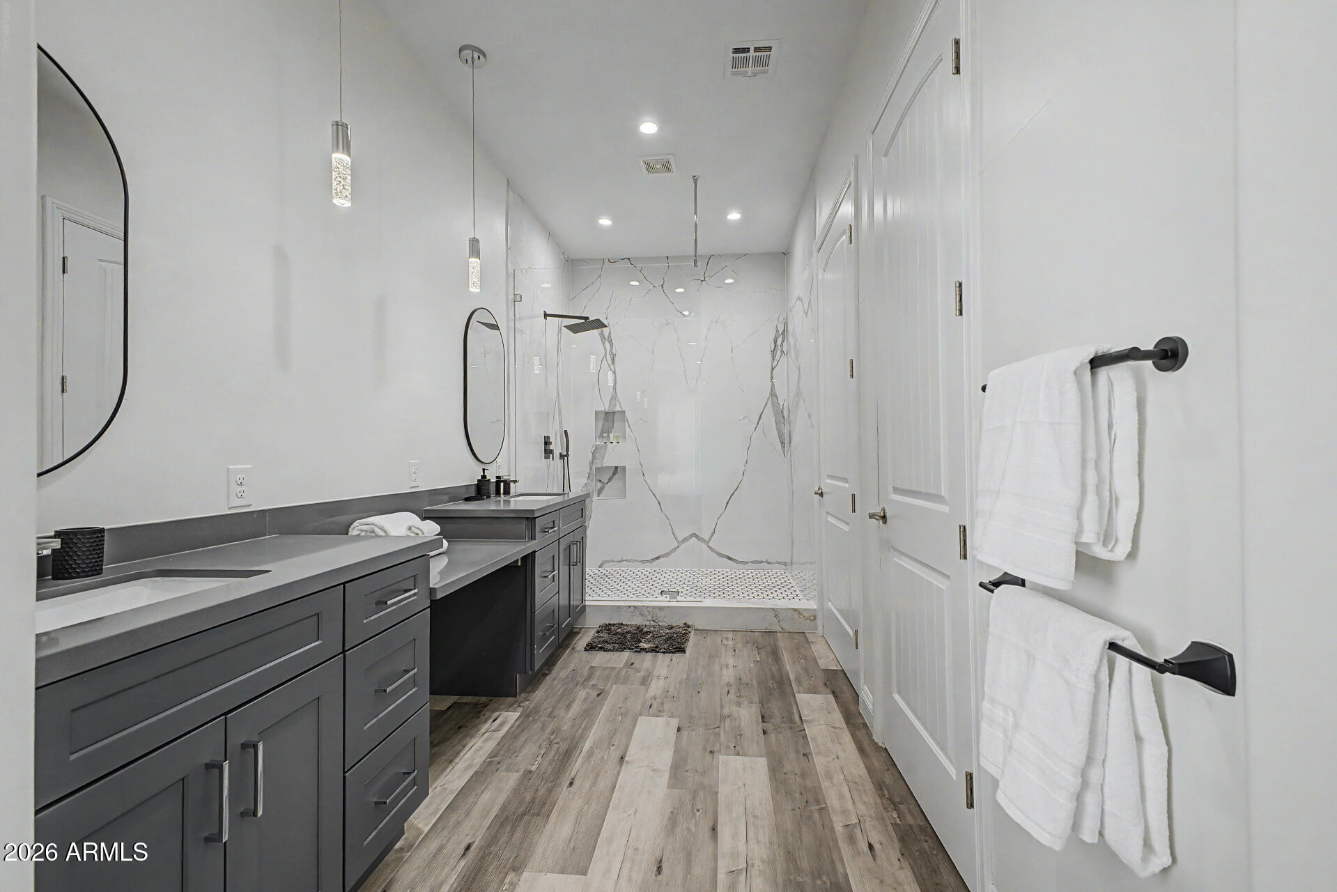 1344 East Polk Street, Unit B Phoenix, AZ 85006 - Photo 13 of 27 a view of a bathroom with a tub sink and mirror