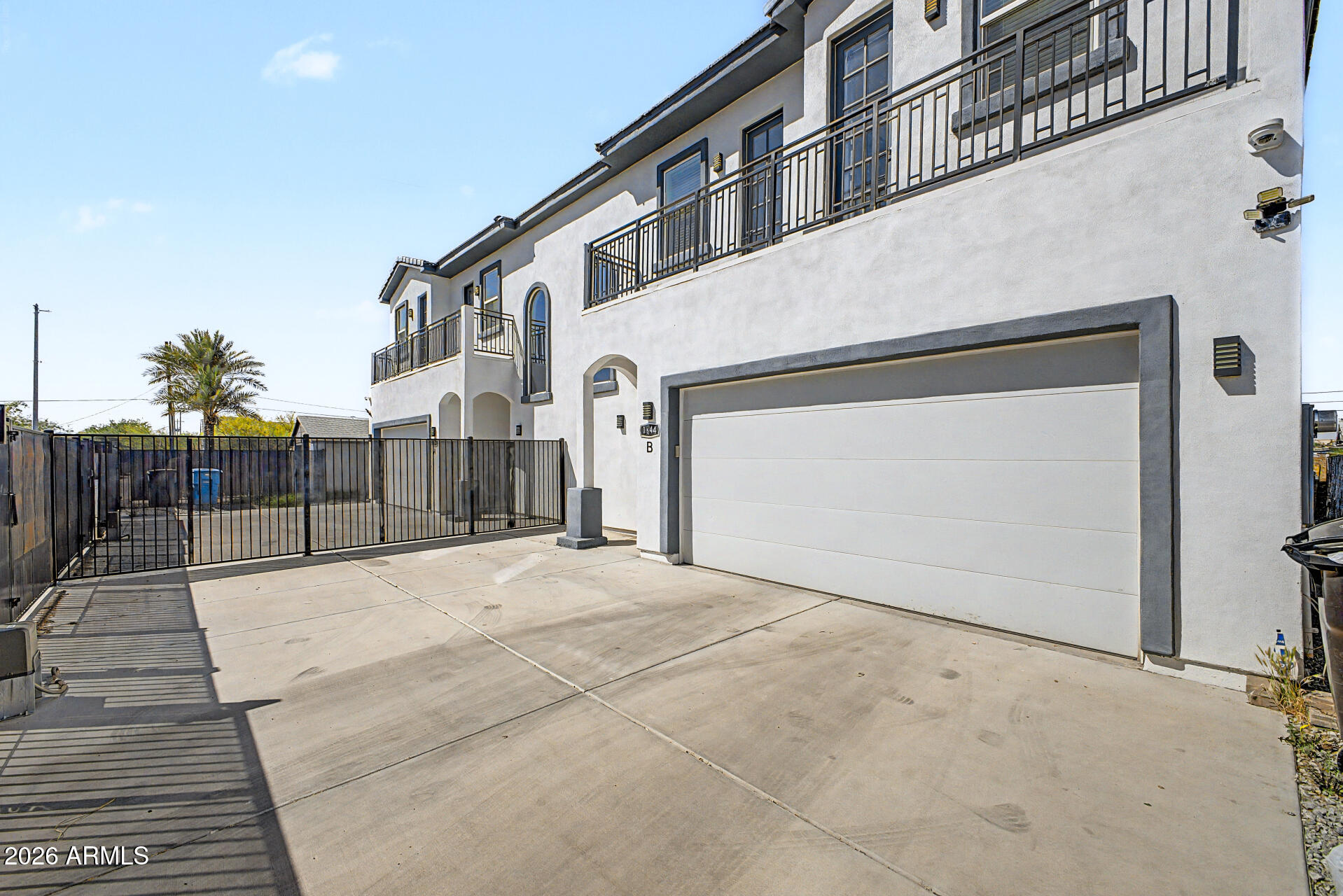 1344 East Polk Street, Unit B Phoenix, AZ 85006 - Photo 24 of 27 a view of a house with a outdoor space