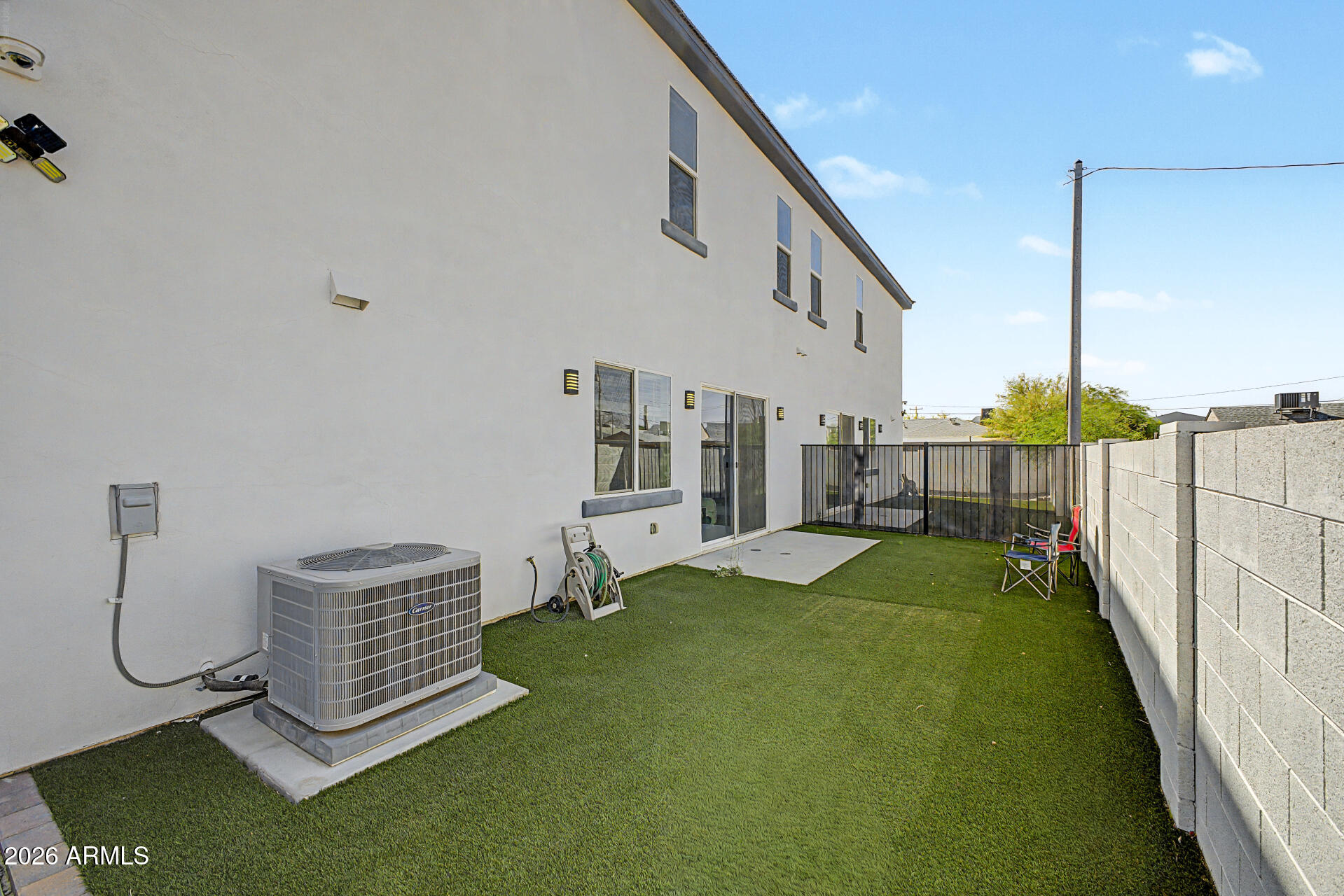 1344 East Polk Street, Unit B Phoenix, AZ 85006 - Photo 25 of 27 a view of an empty room with stairs