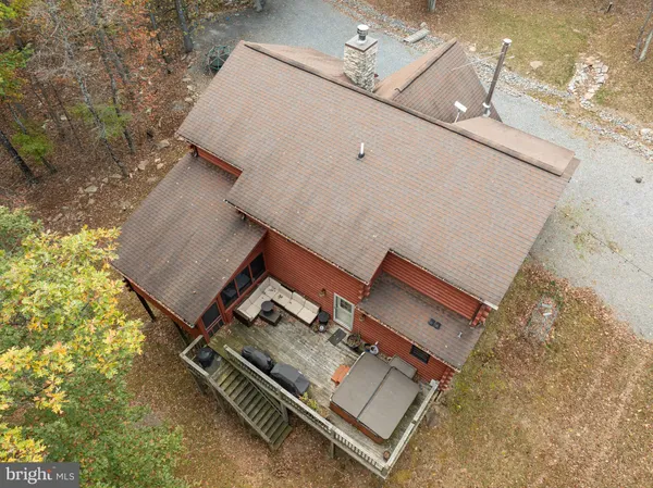 a bedroom with a bed and a table in it