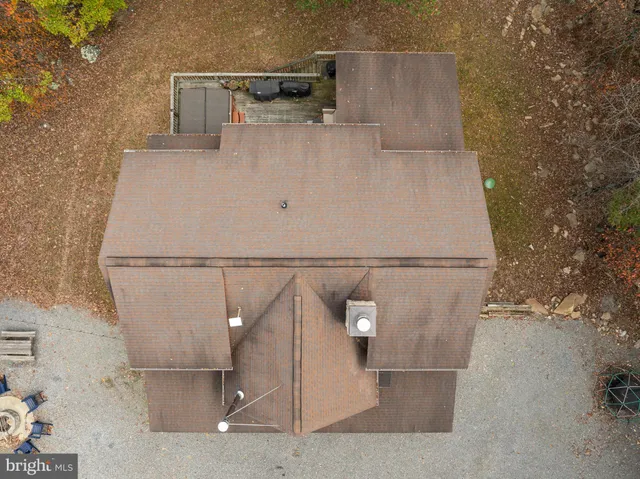 a bedroom with a bed and a table