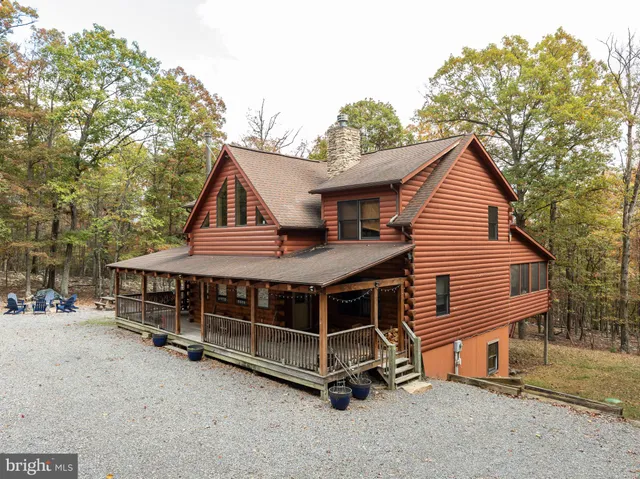 a bedroom with a bed and a table