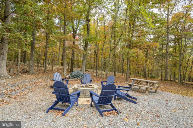 a view of balcony with couch and chairs