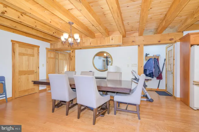 a backyard of a house with outdoor seating