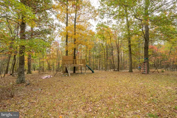 an aerial view of residential house with outdoor space