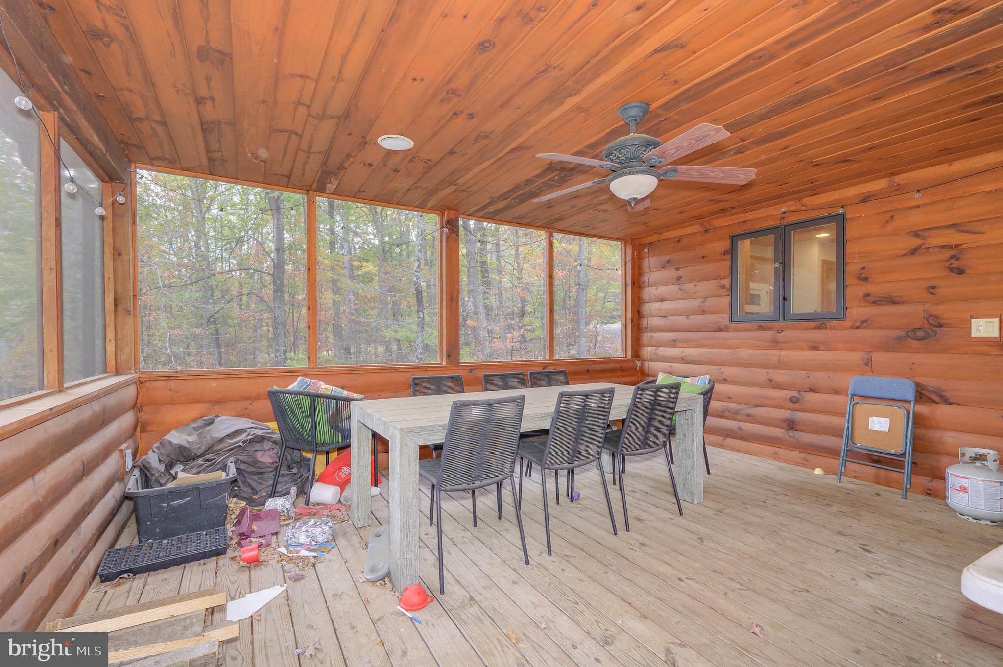 456 Parkside Terrace Berkeley Springs, WV 25411 - Photo 81 of 102 a view of a dining room with furniture window and outside view
