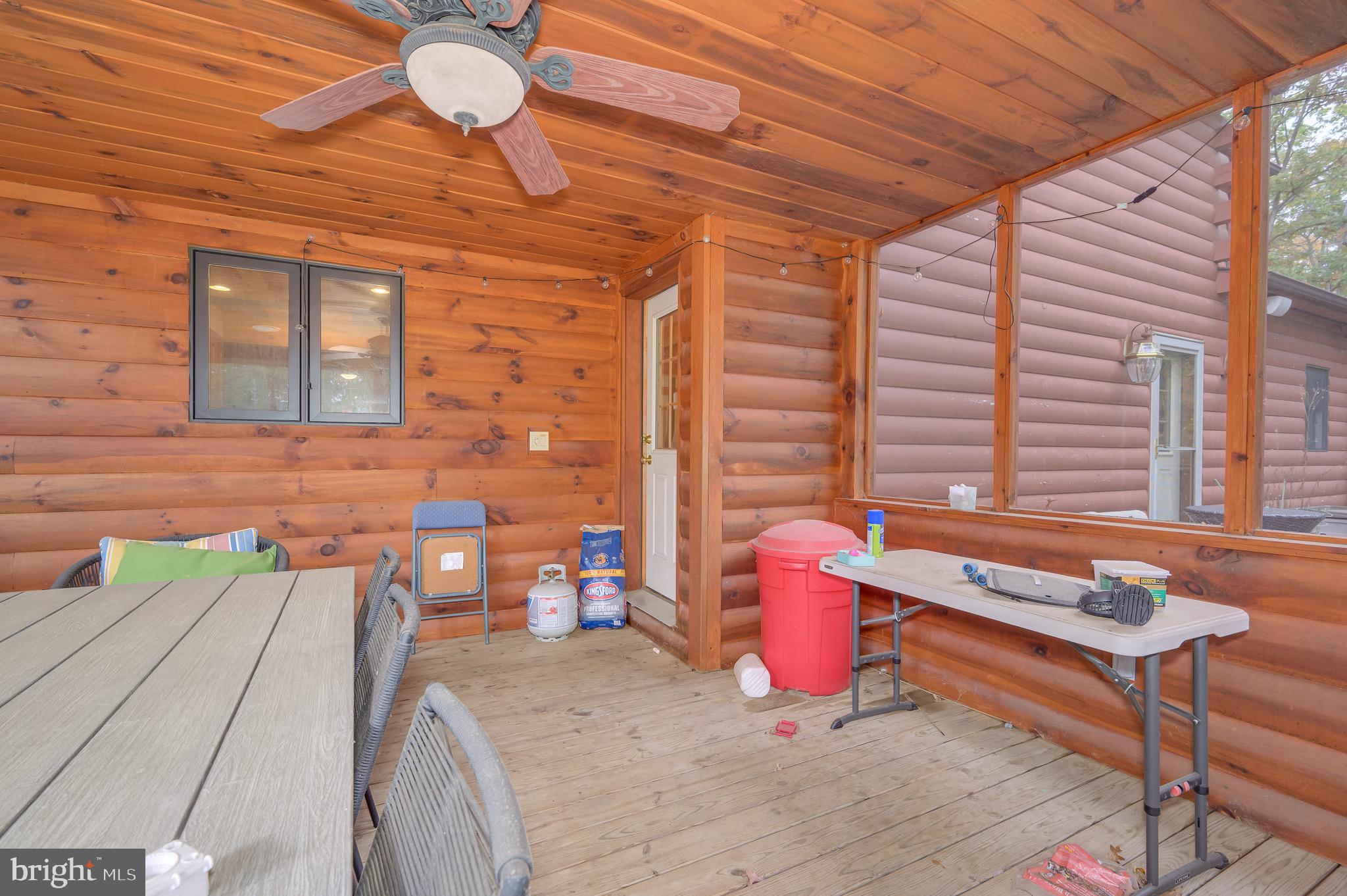 456 Parkside Terrace Berkeley Springs, WV 25411 - Photo 82 of 102 a bedroom with furniture and window