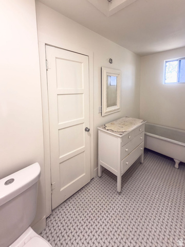 2454 East Old Wellington Road Price, UT 84501 - Photo 16 of 27 New Tile Flooring, Fresh Paint, Vintage Cabinet with Sink ( coming soon) Claw Foot Bathtub