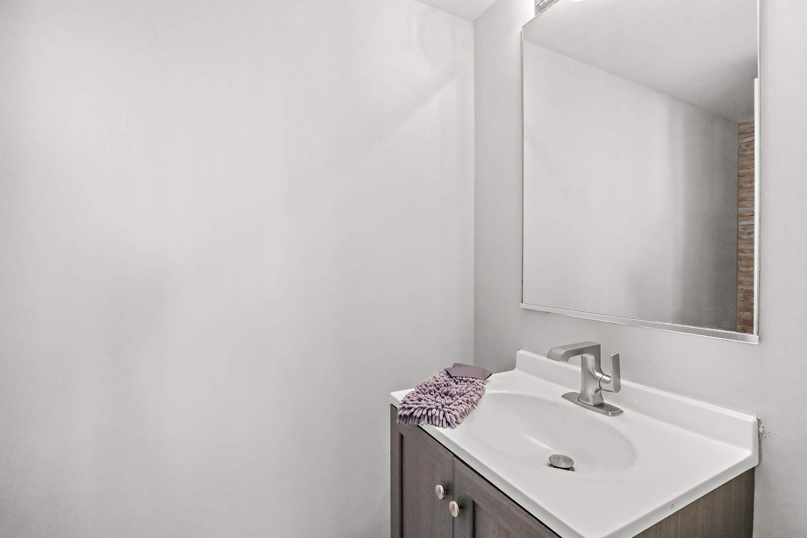 25294 Faraday Road Manhattan, IL 60442 - Photo 11 of 16 a bathroom with a sink and a mirror