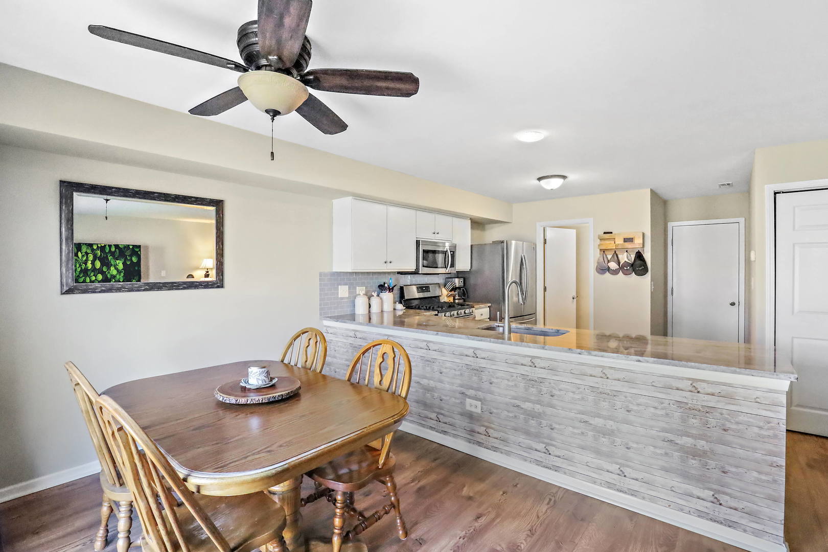 25294 Faraday Road Manhattan, IL 60442 - Photo 8 of 16 a view of a dining room with furniture and a table