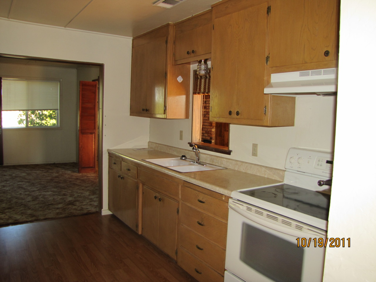 4604 Webb Road Anderson, CA 96007 - Photo 3 of 9 a kitchen with a sink stove and cabinets