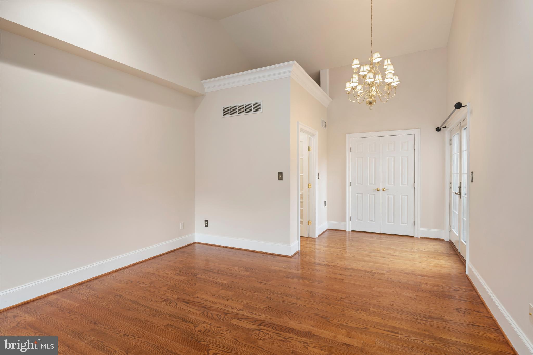 1410 Falls Crest Drive Fallston, MD 21047 - Photo 23 of 58 a view of an empty room with wooden floor