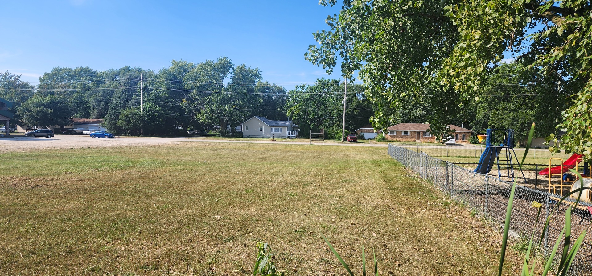 549 West Kennedy Road Braidwood, IL 60408 - Photo 3 of 17 a view of a backyard with a table and chairs