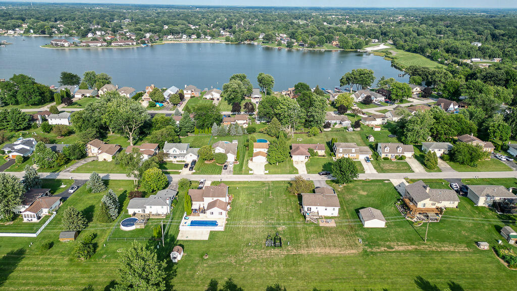 3894 Brookside Drive Crown Point, IN 46307 - Photo 3 of 4 a view of a lake with a city