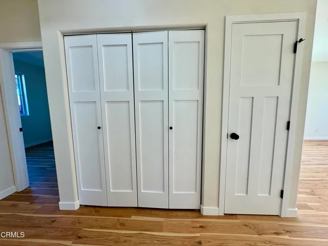 a bathroom with a double vanity sink and mirror