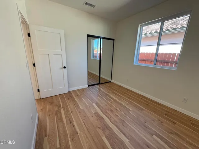 a en suite bathroom with a sink and glass door