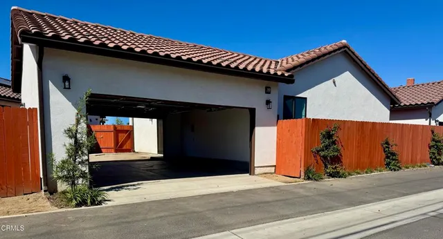a view of a house with a garage