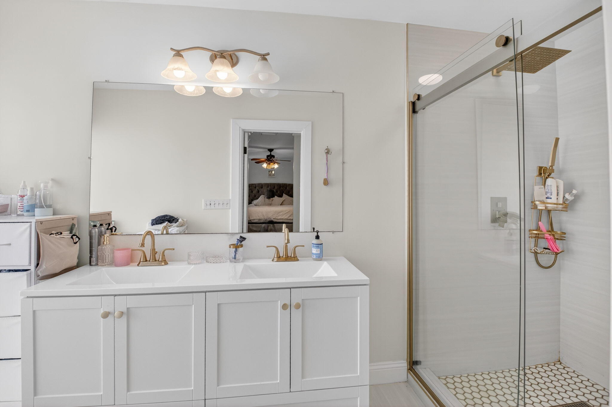 2402 Northwest 30th Street Boca Raton, FL 33431 - Photo 21 of 45 a bathroom with a sink a vanity and a mirror