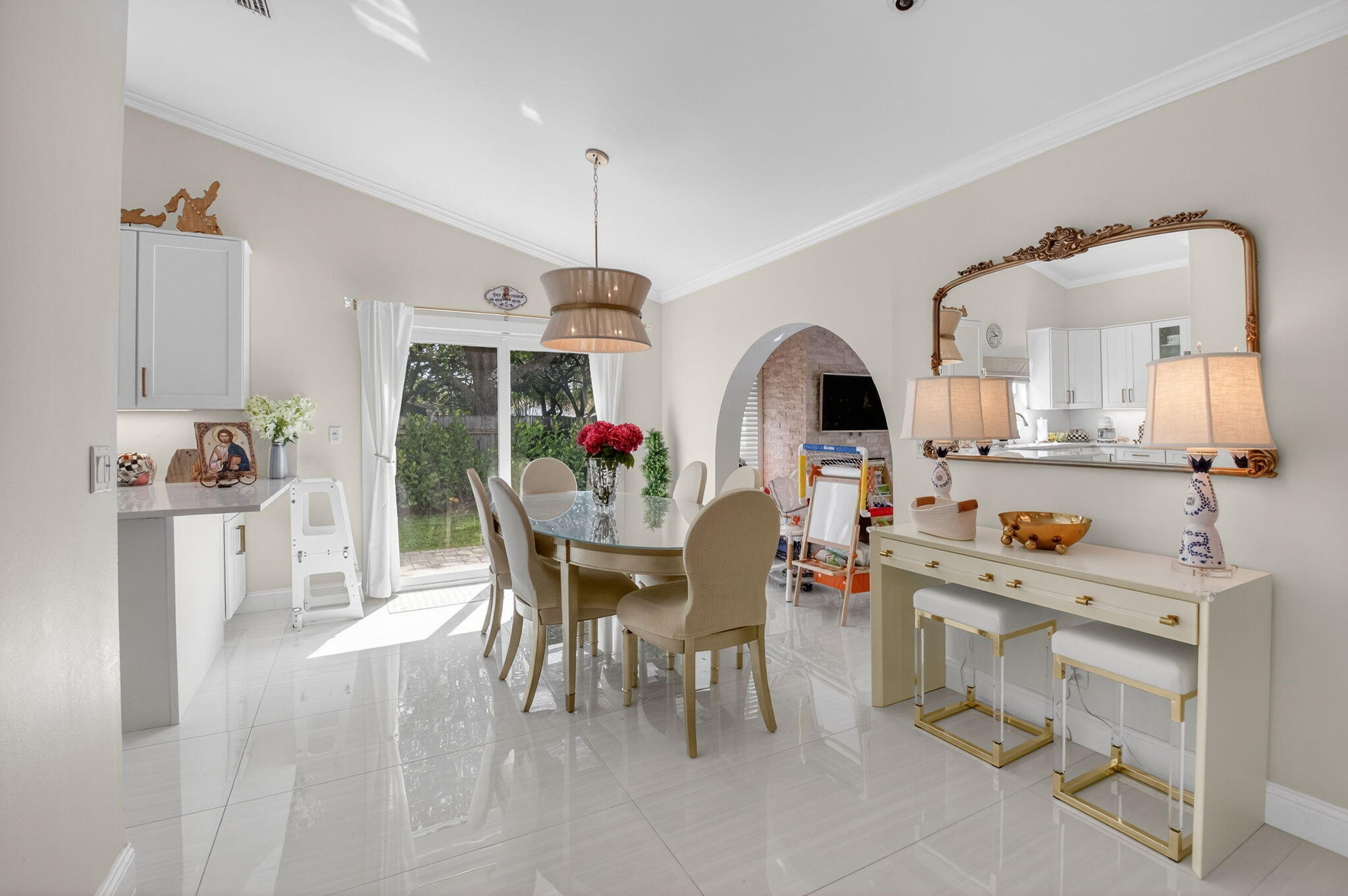 2402 Northwest 30th Street Boca Raton, FL 33431 - Photo 7 of 45 a view of a dining room with furniture and chandelier