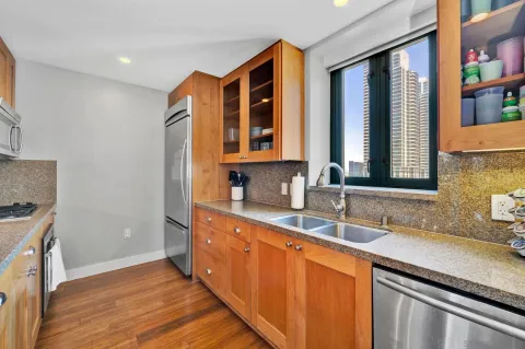 a bathroom with a sink double vanity and a mirror