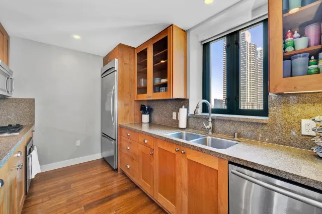 a bathroom with a sink double vanity and a mirror