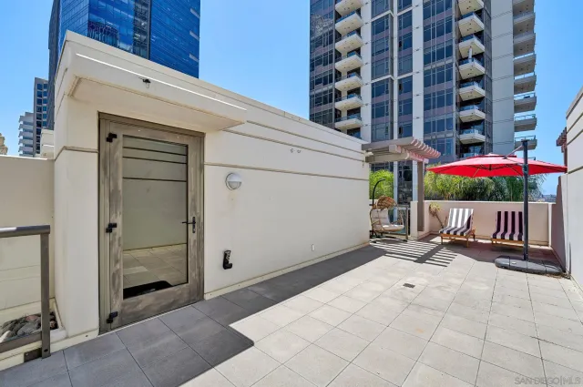 a view of a balcony with door