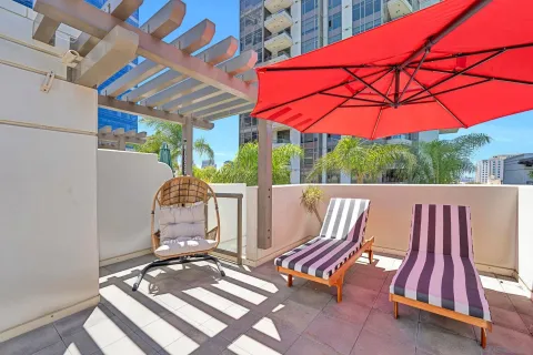 a view of yard with patio