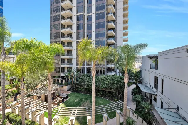 a view of a building with a yard