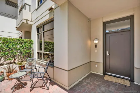 a view of a livingroom with furniture and front door