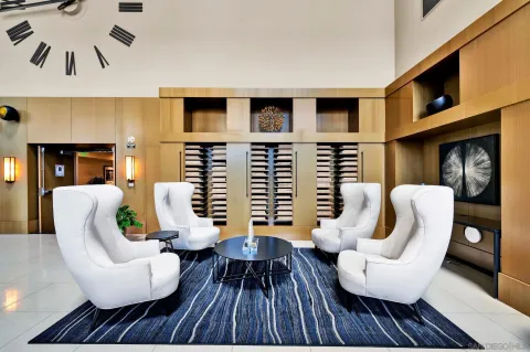 a living room with furniture fireplace and a flat screen tv