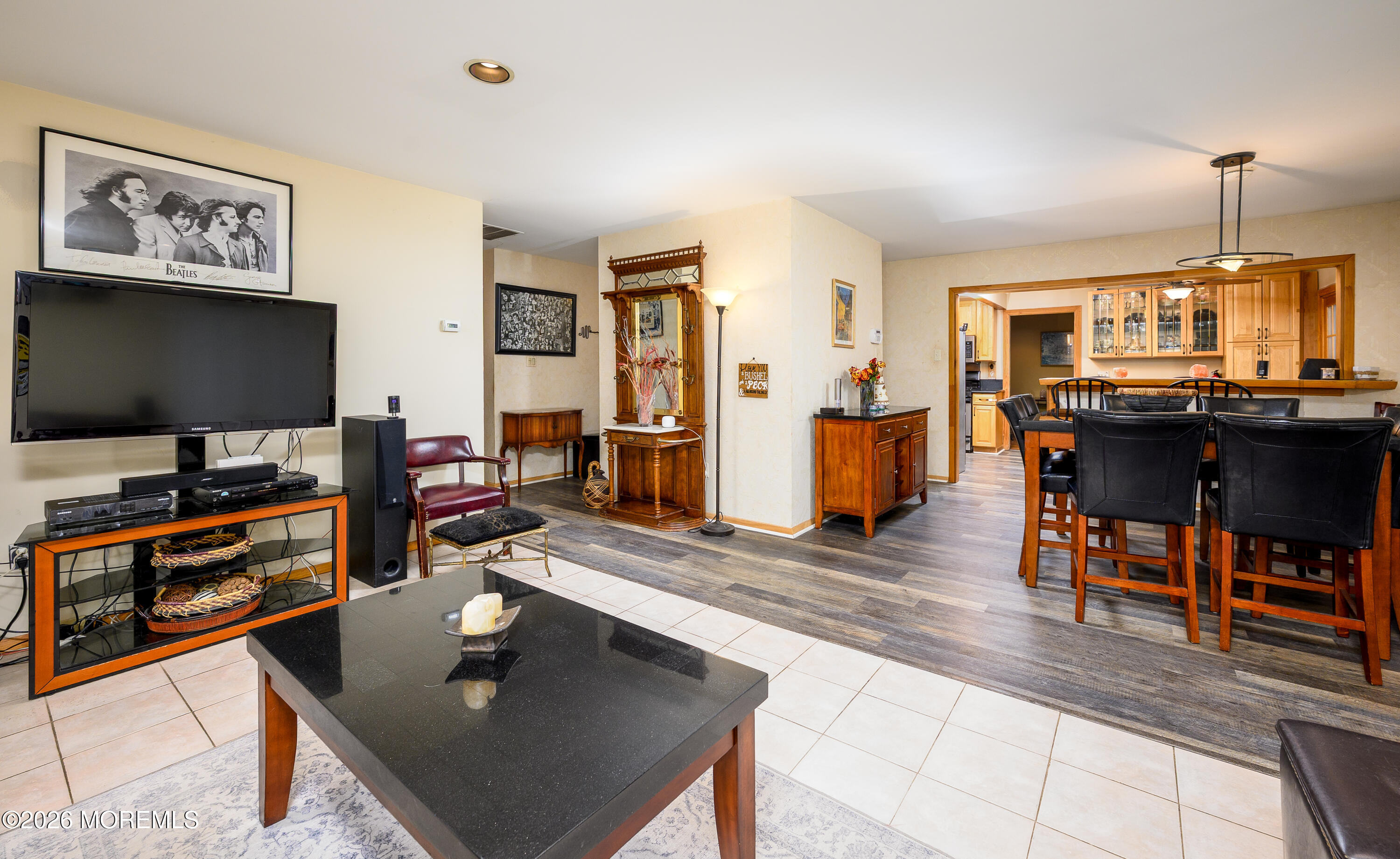 351 Taylors Mills Road Manalapan, NJ 07726 - Photo 12 of 29 a living room with furniture and a flat screen tv
