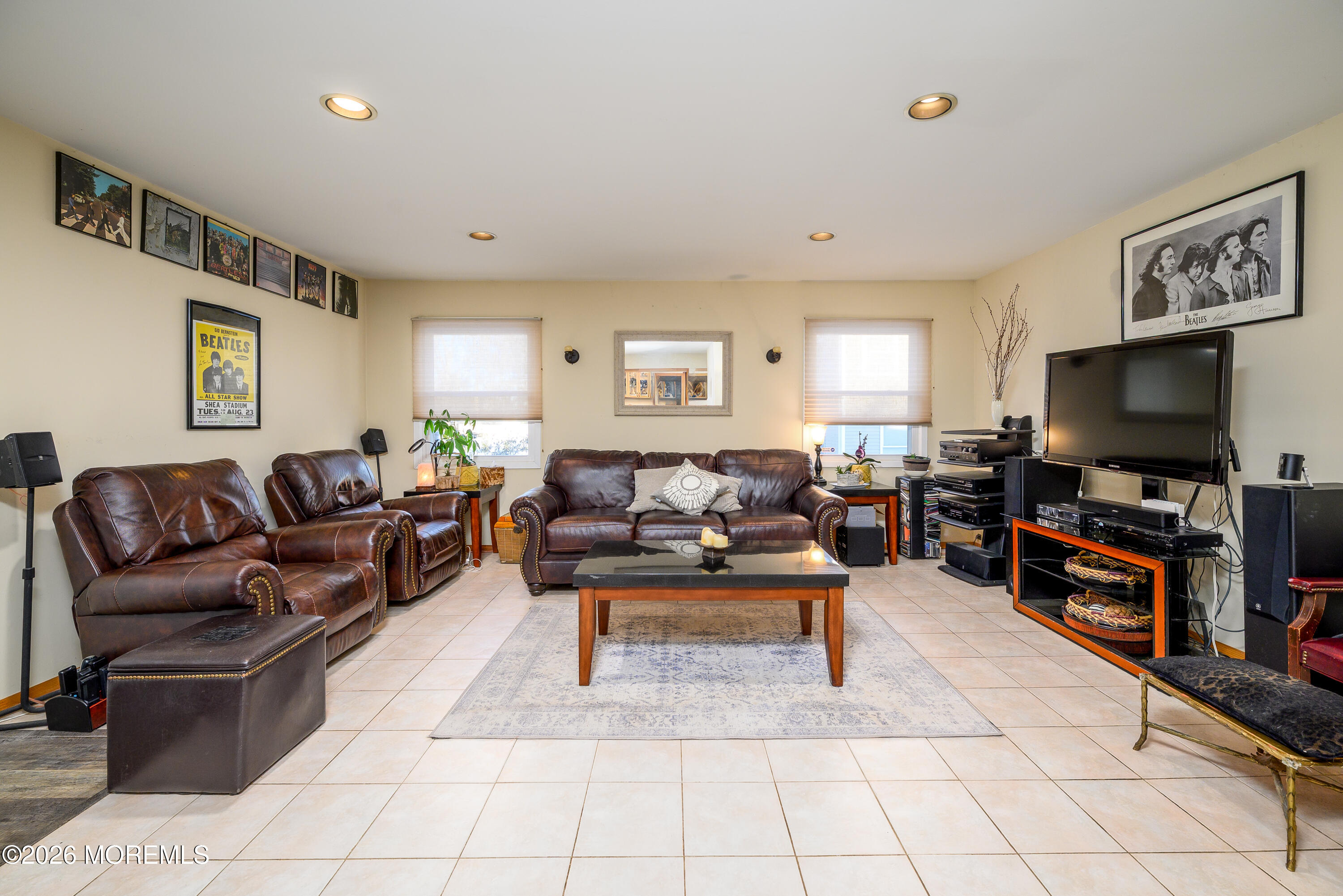 351 Taylors Mills Road Manalapan, NJ 07726 - Photo 8 of 29 a living room with furniture and a flat screen tv